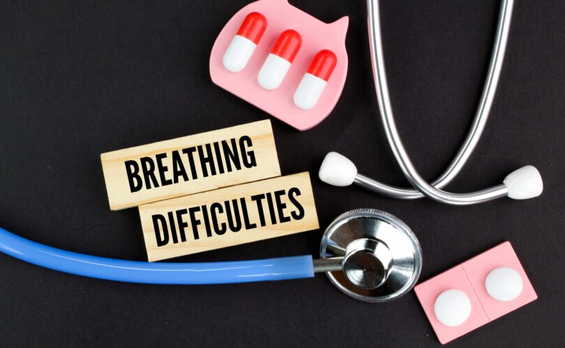 stethoscope and medicine with the word breathing difficulties