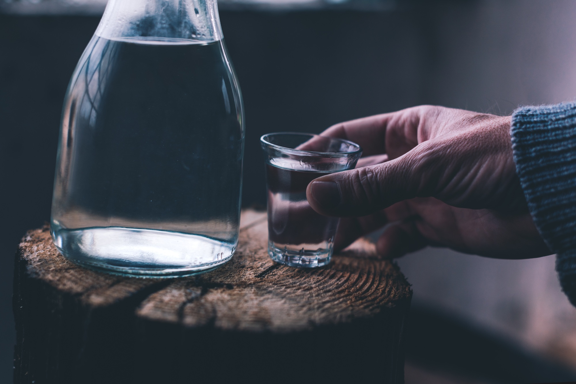 Man drinking strong alcohol drink