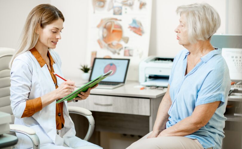 Senior patient with ophthalmologist in the office