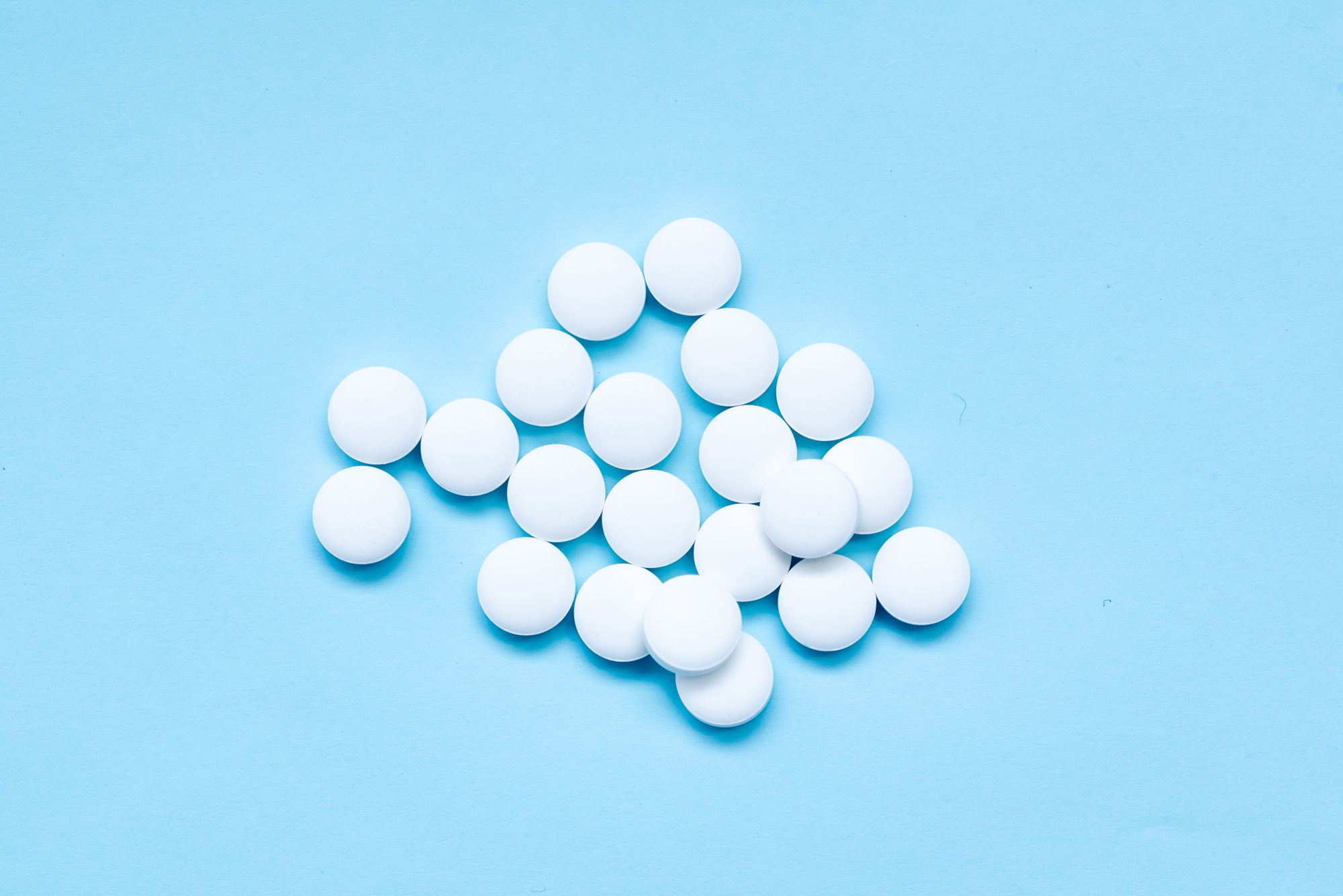 Close up of white tablets (medicine)